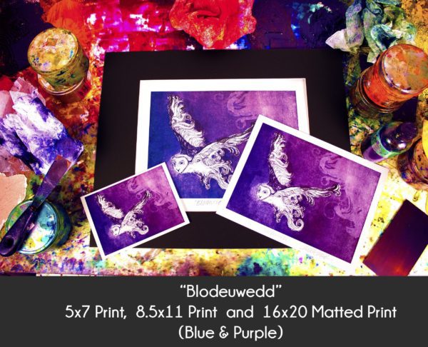 Photo of Blodeuwedd Owl products in 5x7 Print, 8.5x11 Print and 16x20 matted print on an etching inking station to display size differences in the blue and purple color option only